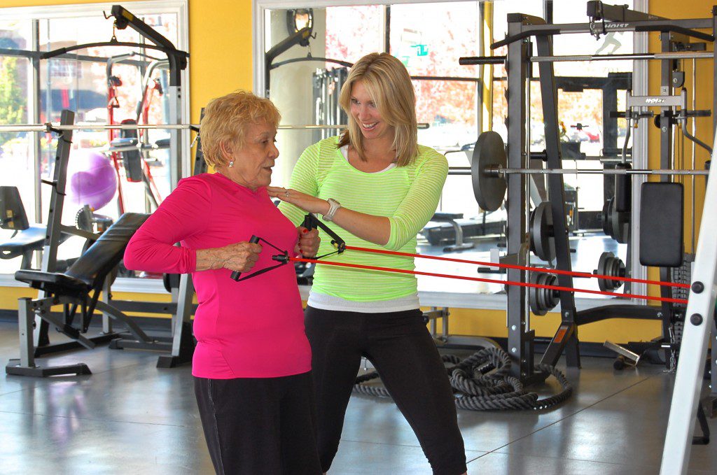 Charity Working Out. She helps others lose weight with proper training and Isagenix