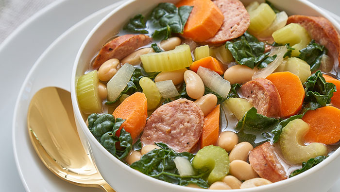 Bowl of kale and sausage soup