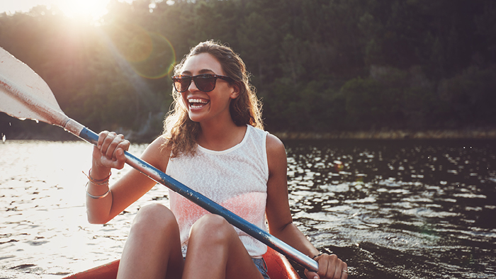 Woman kayaking in a lake