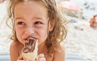 Boy eating ice cream cone