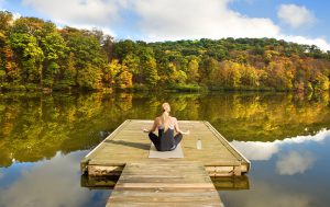 fall, woman doing yoga, lake