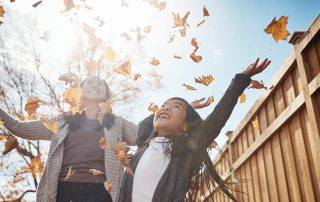 mom daughter fall leaves