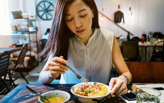 A woman enjoying a healthy meal