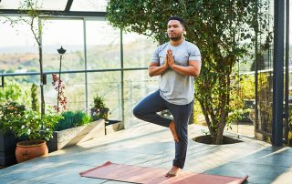 Man stretching outside