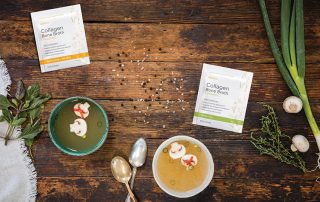Collagen Bone Broth in bowls on a wood background