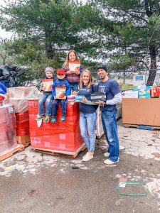 Jessica Brito and her family helping distribute donations