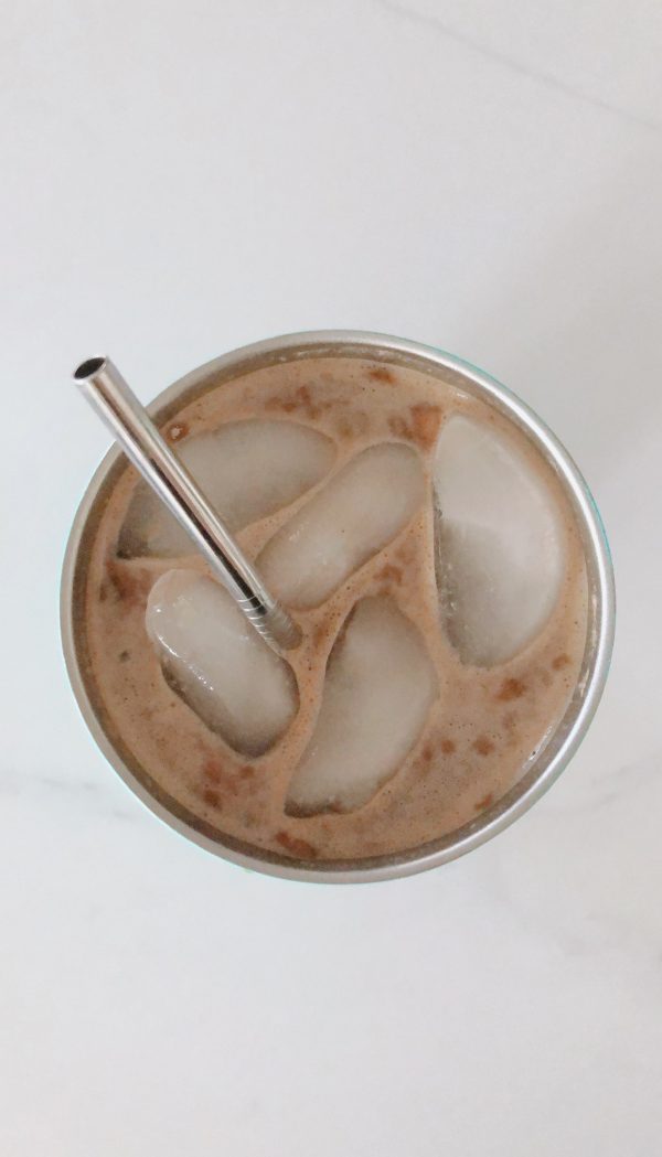 Protein coffee with metal straw