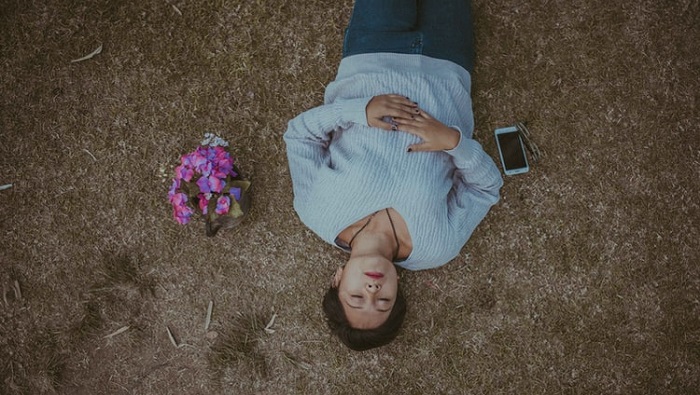 Woman meditating outside