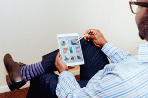 AI for Business - Man Working on Tablet