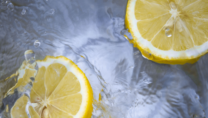 Lemons floating in water