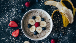 Bowl of oatmeal with berries and banana