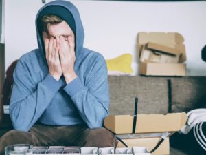 Hobbies - Stressed Guy in Hoodie