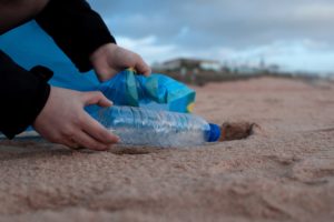 Plastics-Green_Plastic Bottle on Beach