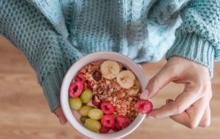 Hands holding oatmeal