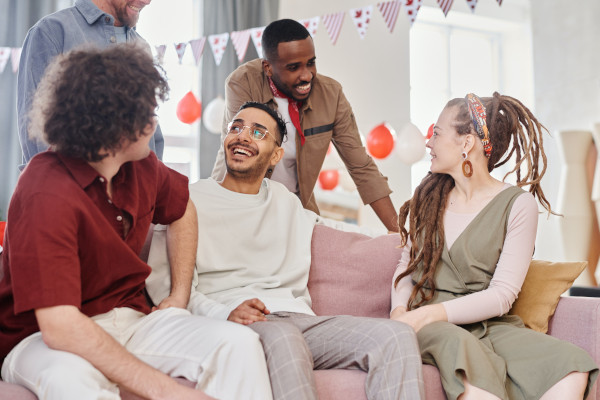 Friends socializing indoors at home